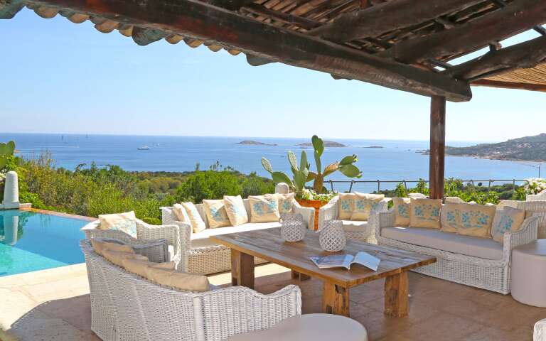 outdoor lounge area with sea view