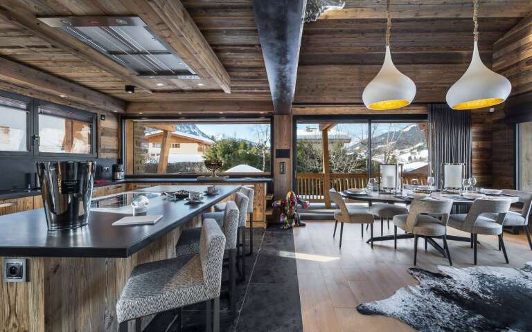 contemporary open space with gourmet kitchen and dining area