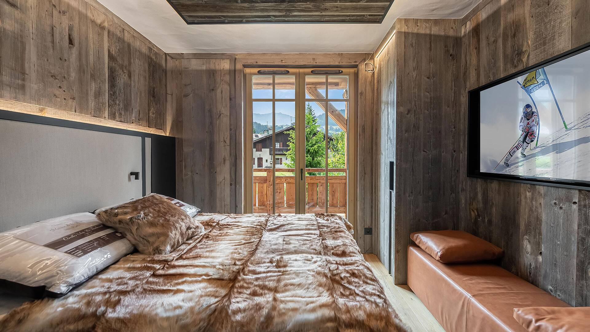 double bedroom with TV