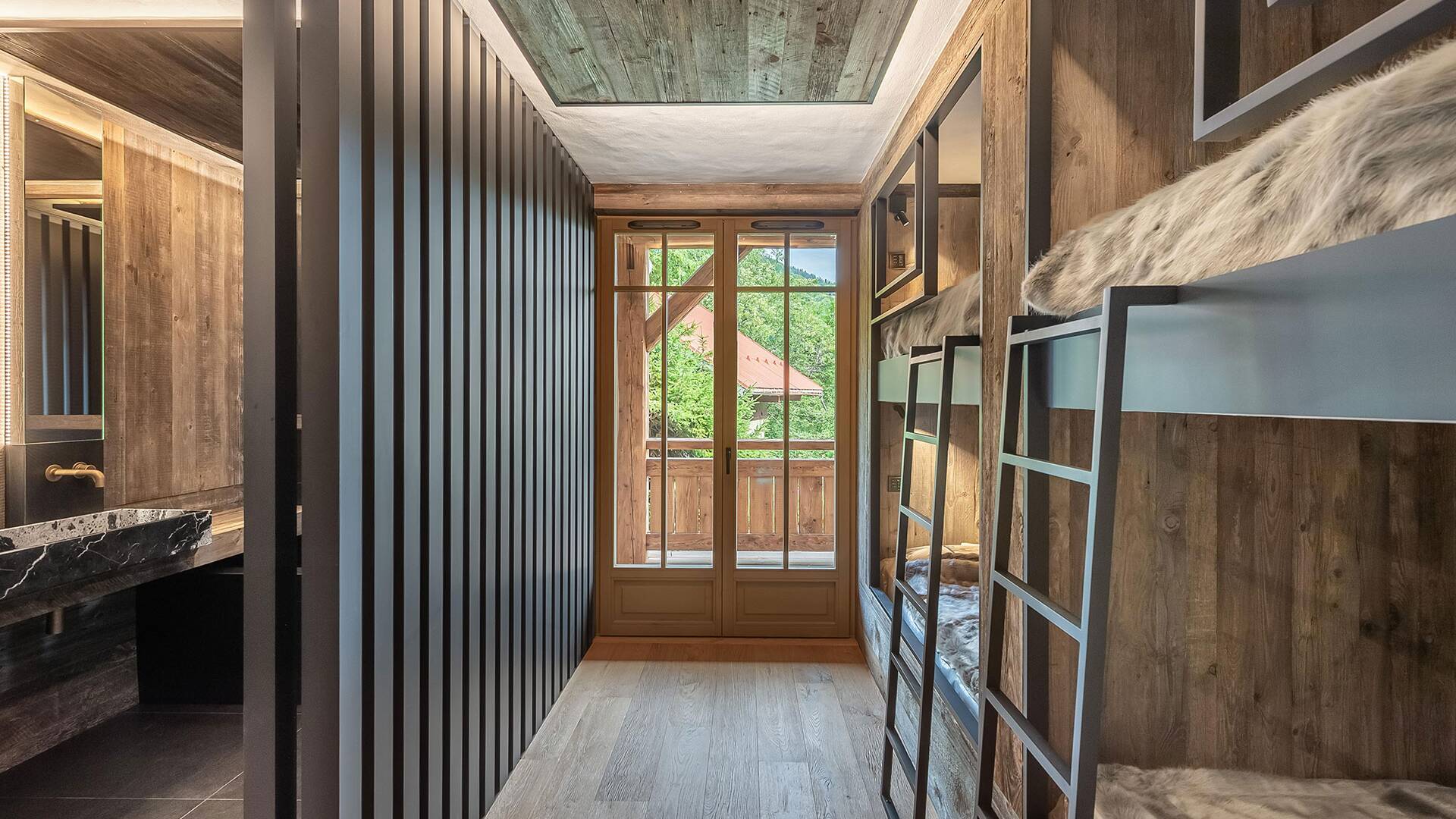 quadruple bedroom with 2 sets of bunk beds and en suite bathroom