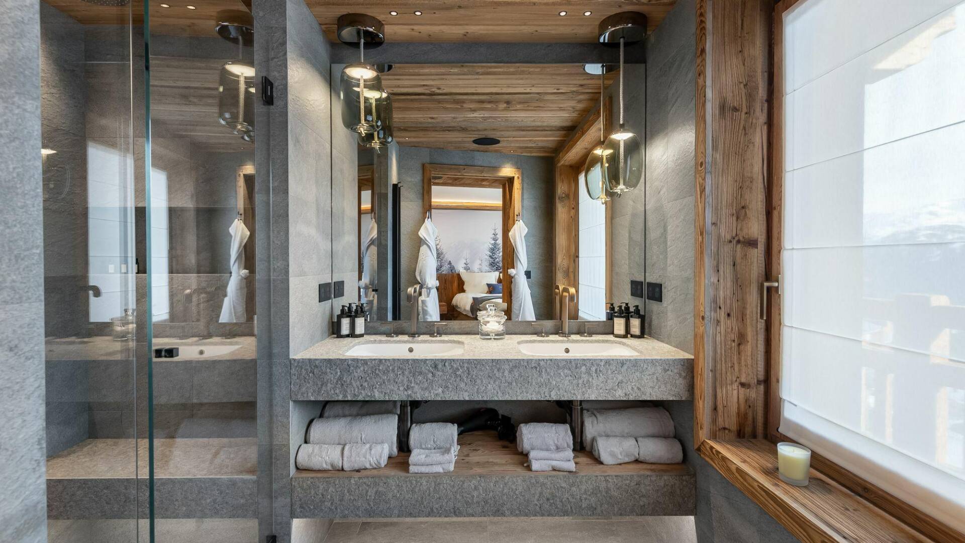 en suite bathroom with double lavabo and shower cabin