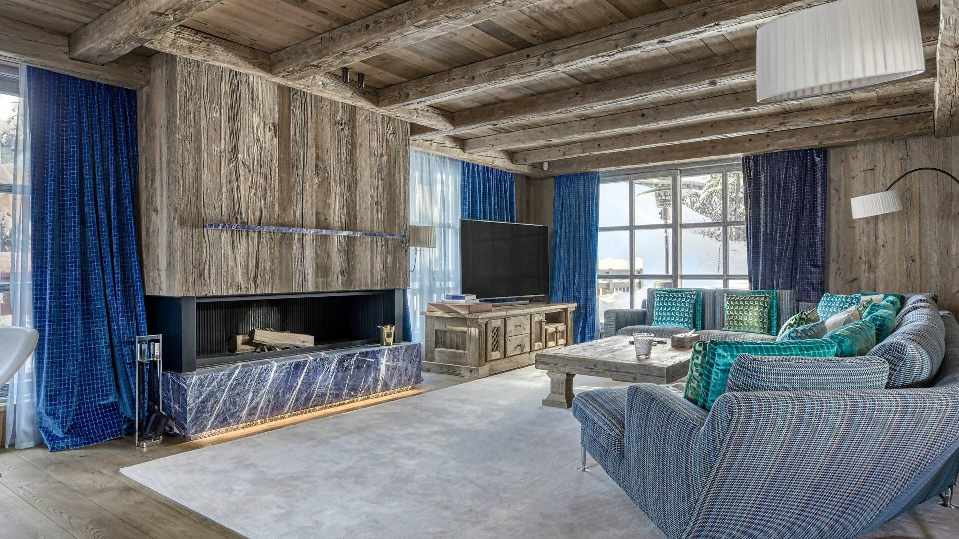 living room with fireplace and TV