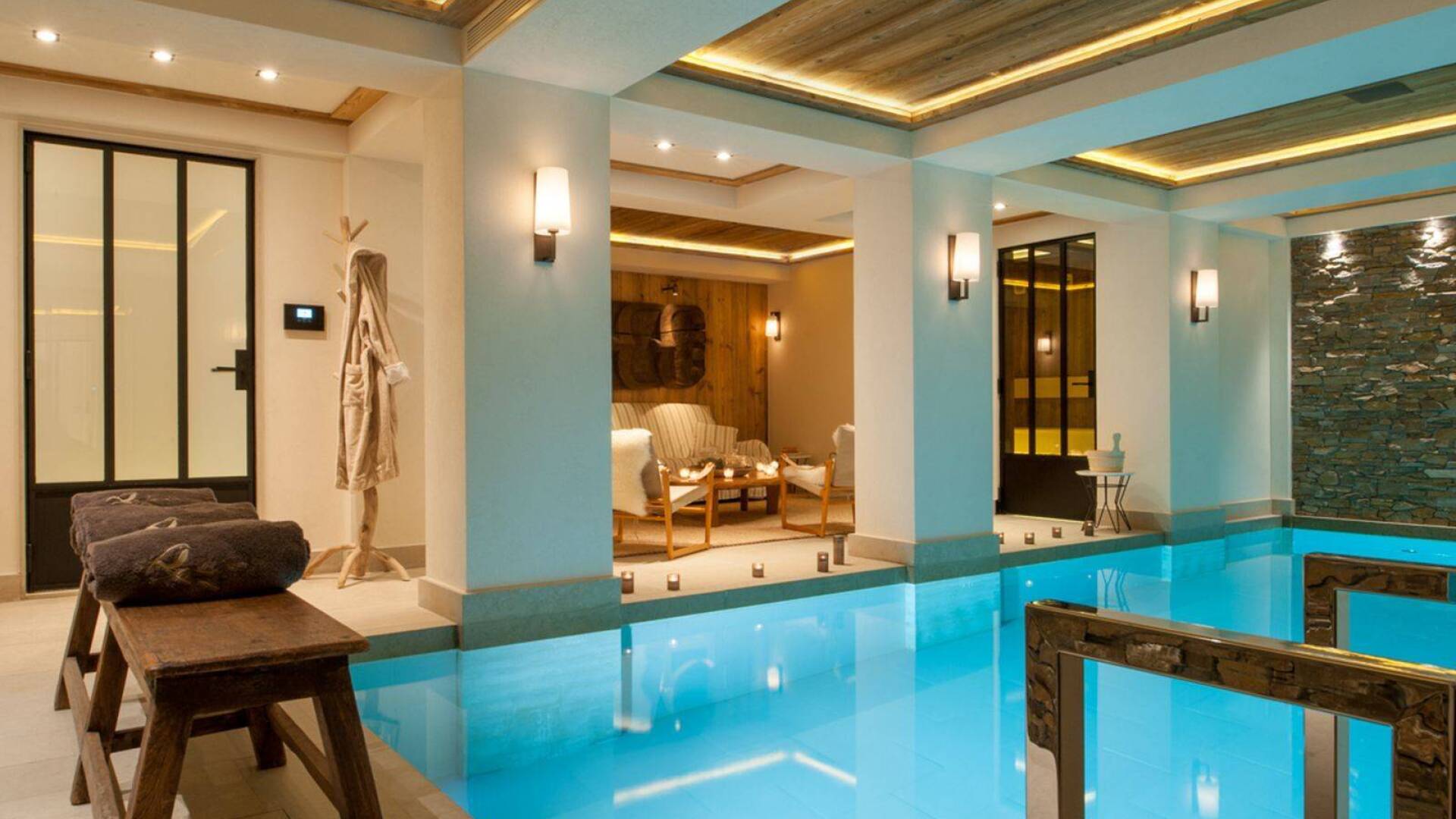 indoor pool with lounge area