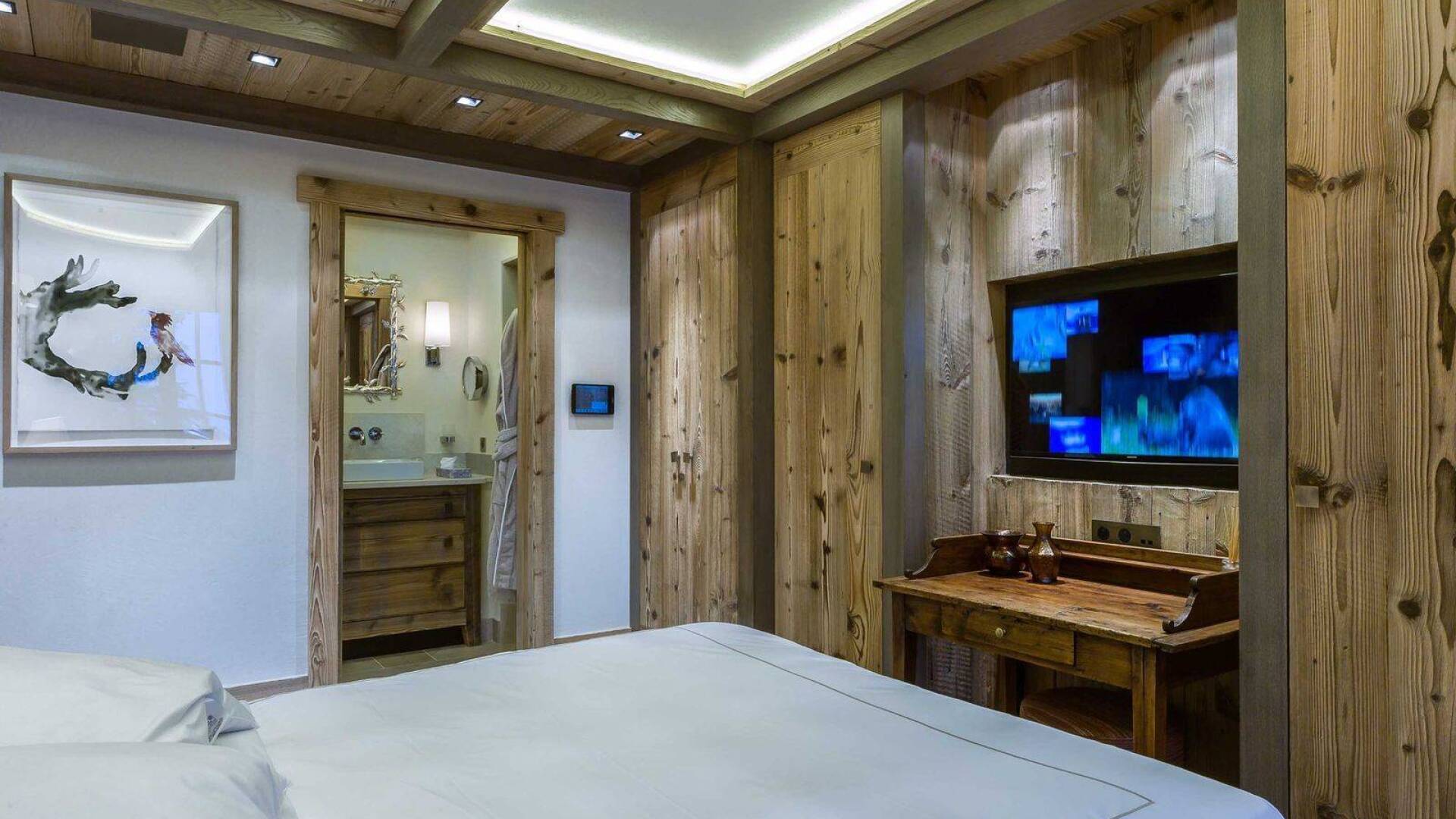 double bedroom with TV