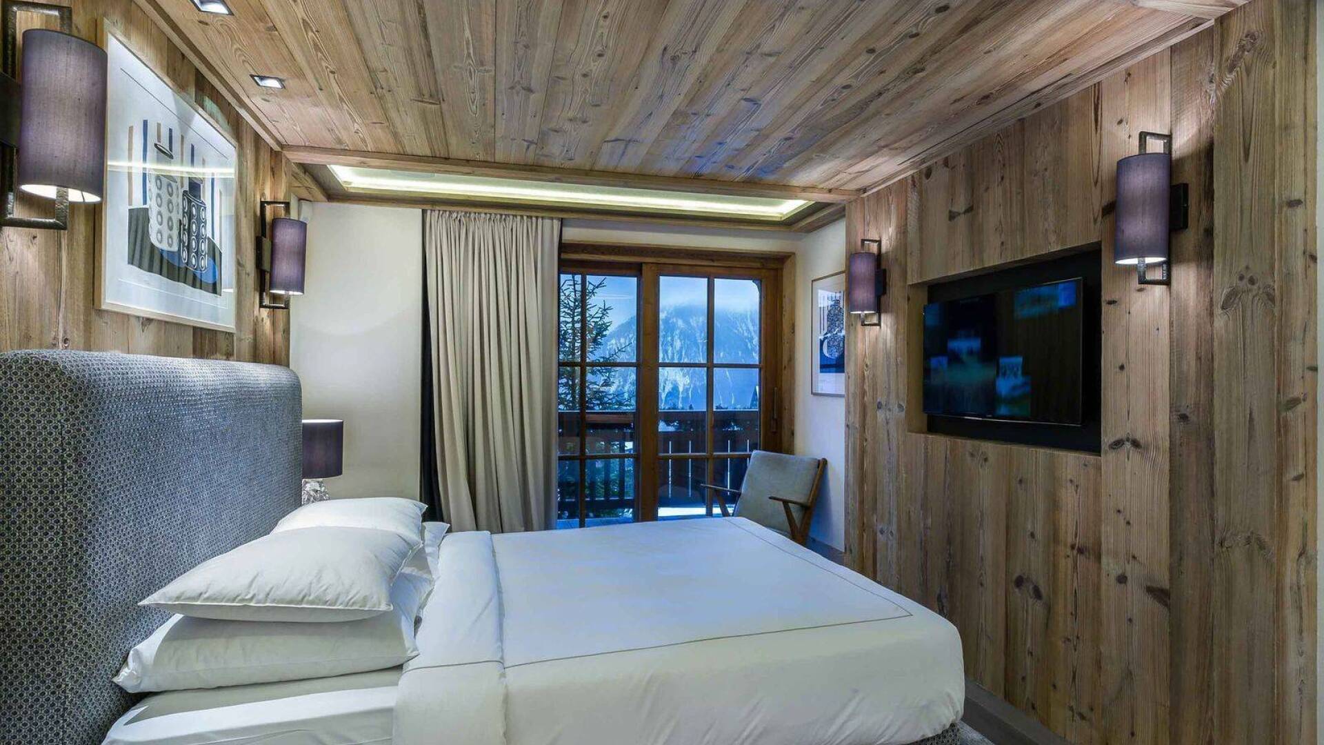 double bedroom with TV