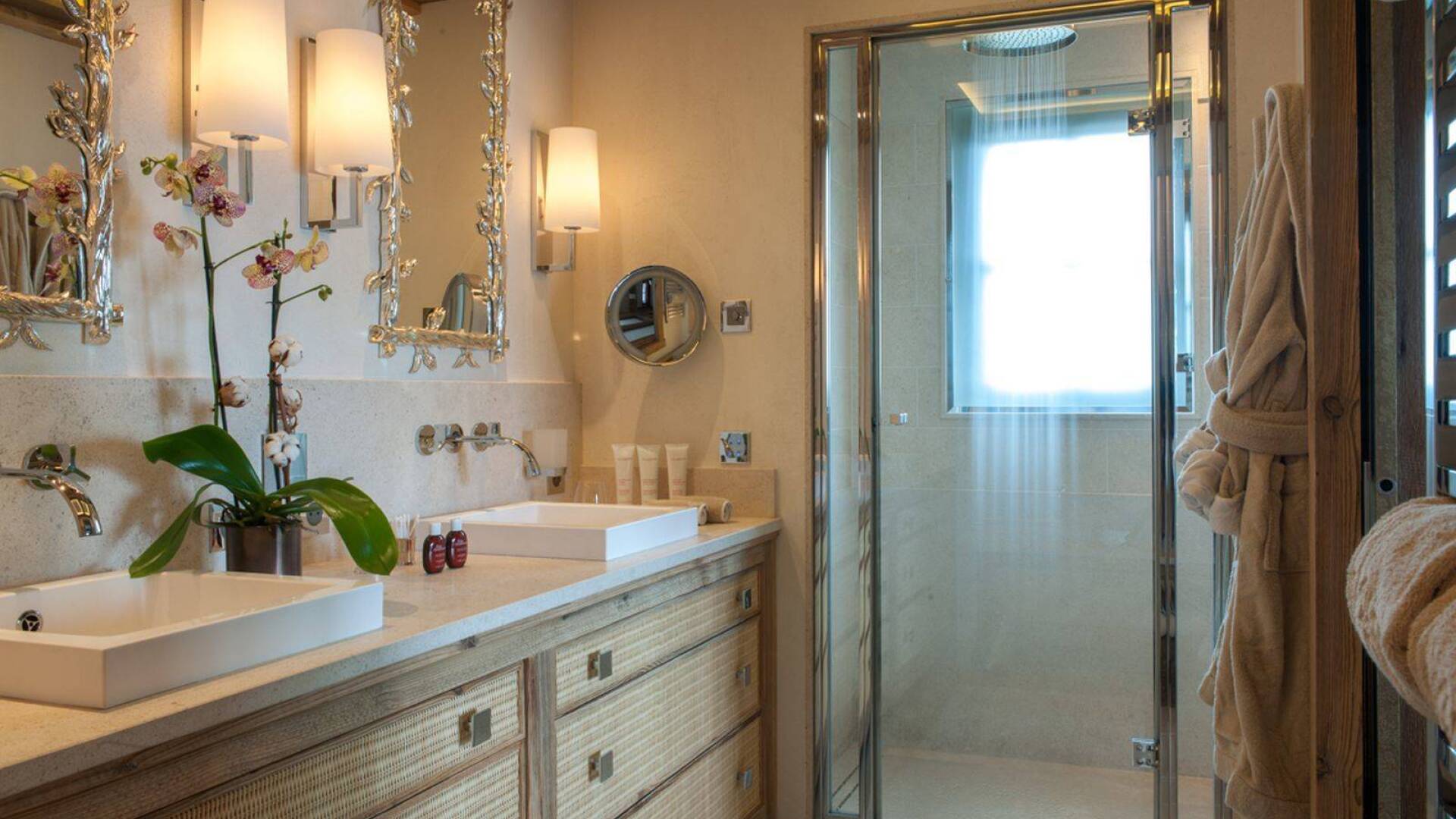en suite bathroom with double lavabo and shower cabin