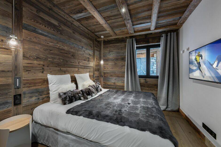 double bedroom with TV