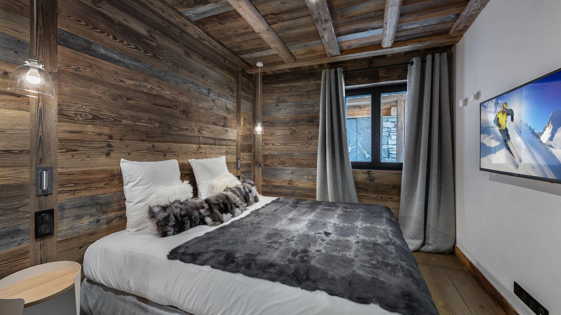 double bedroom with TV