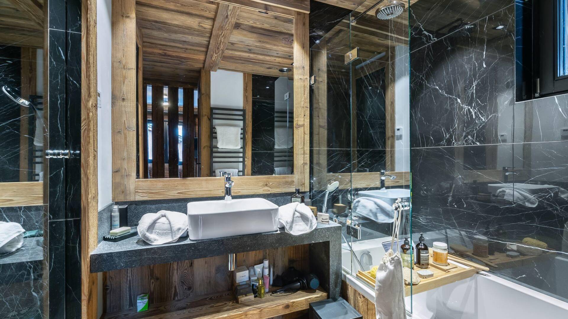 en suite bathroom with bath tub