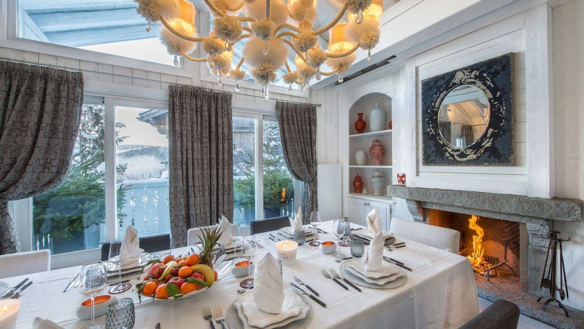 glamorous dining area with fireplace
