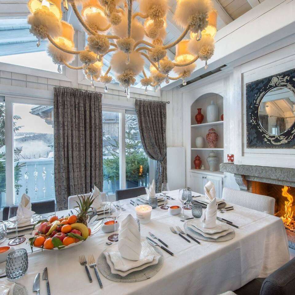 glamorous dining area with fireplace