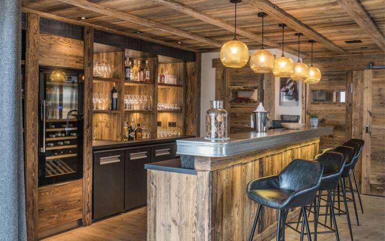 corner bar with counter and stools