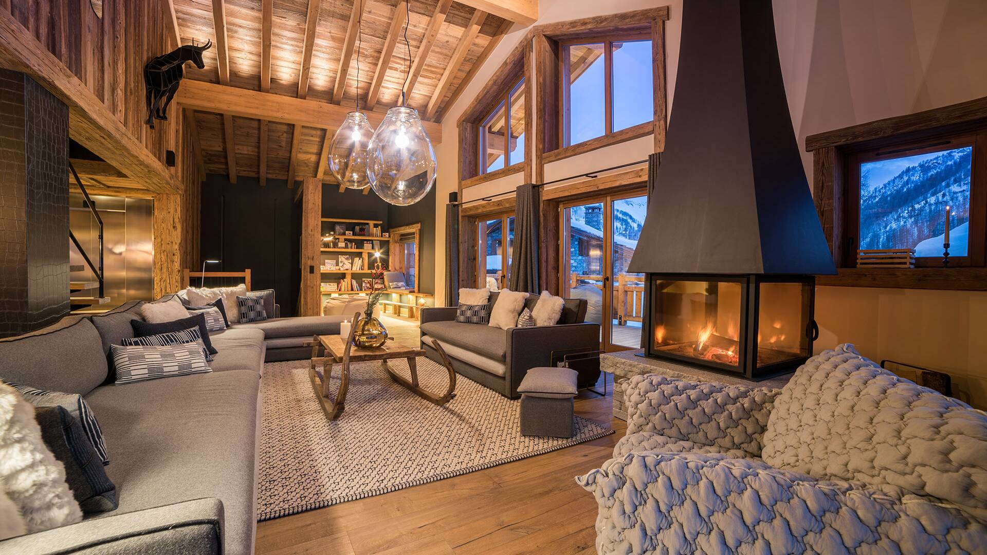 luxury living room with French windows and fireplace