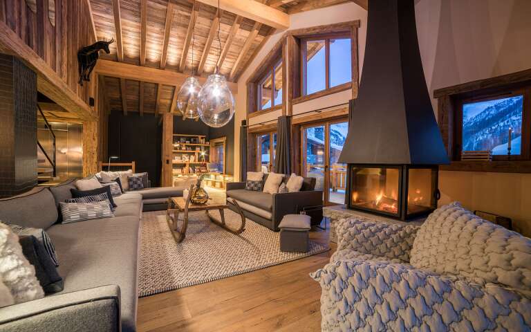 luxury living room with French windows and fireplace