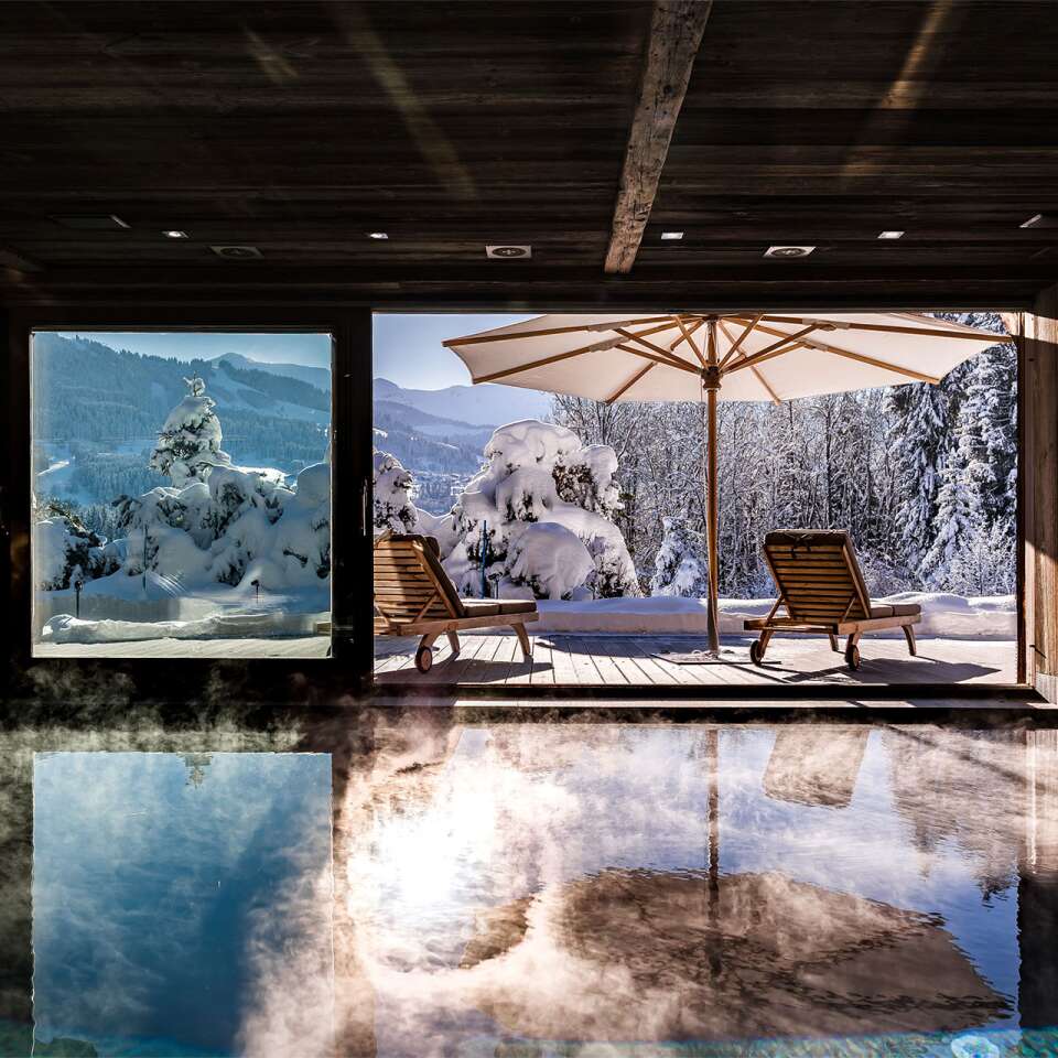 luxury indoor pool with breathtaking mountain views
