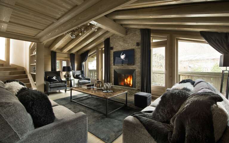 contemporary living room with majestic windows, TV and fireplace