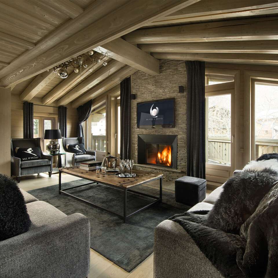 contemporary living room with majestic windows, TV and fireplace