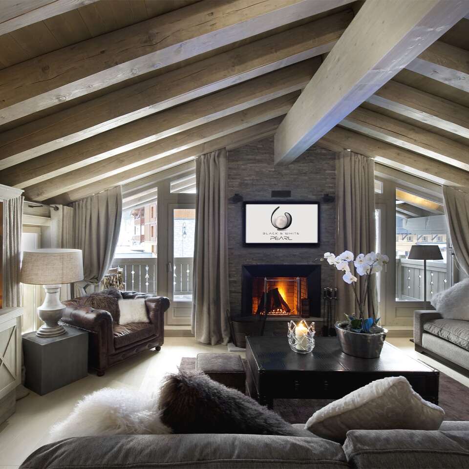 living room with TV and fireplace