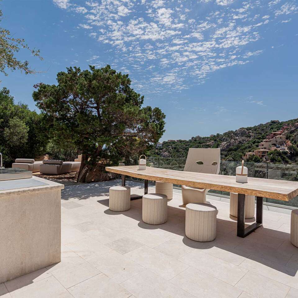 outdoor kitchen with al fresco dining table