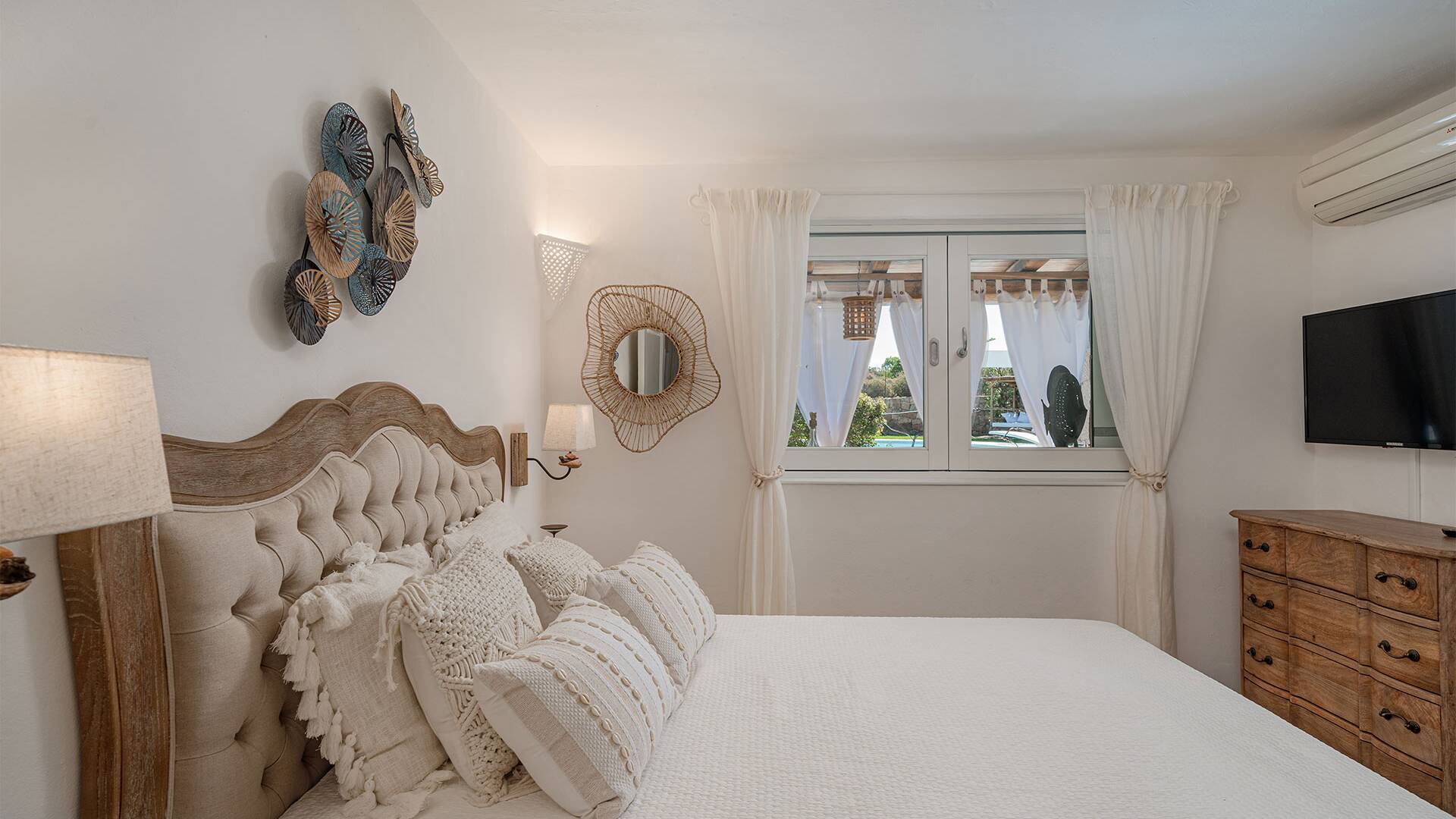 double bedroom with TV