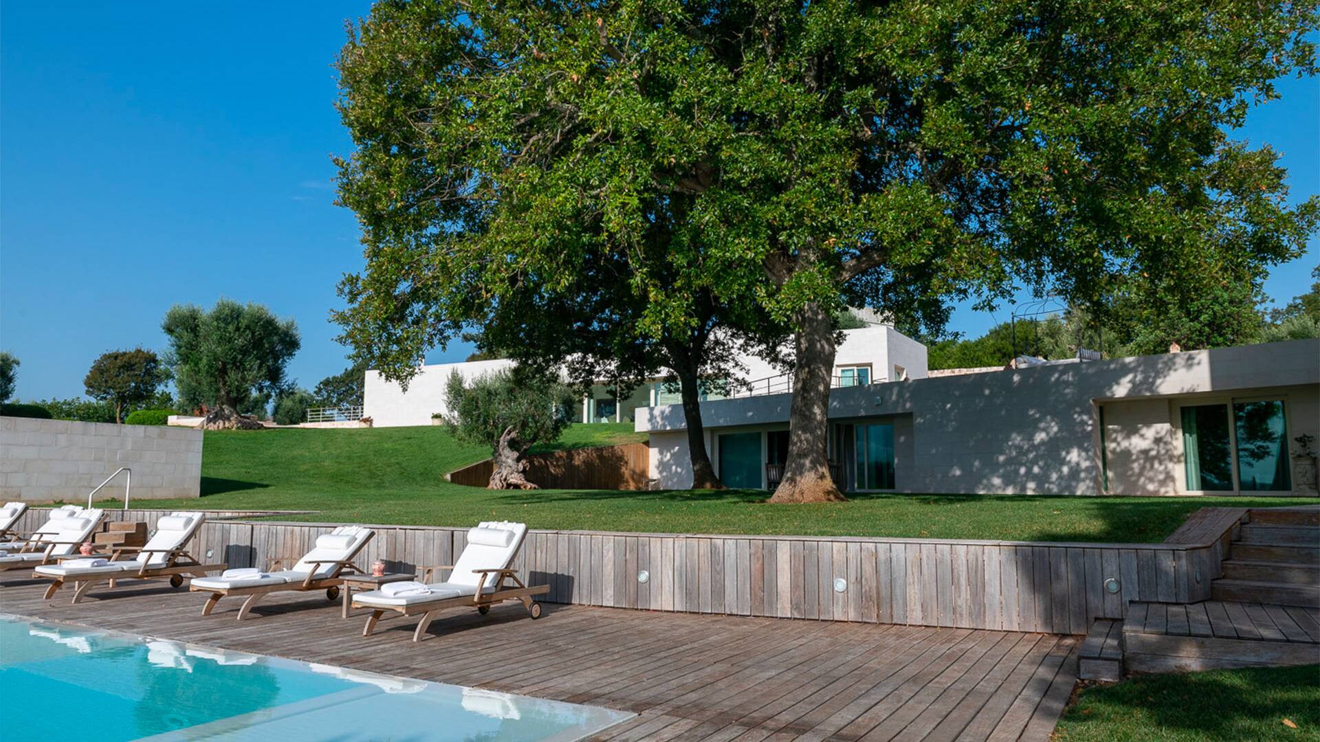 private pool with sunbeds