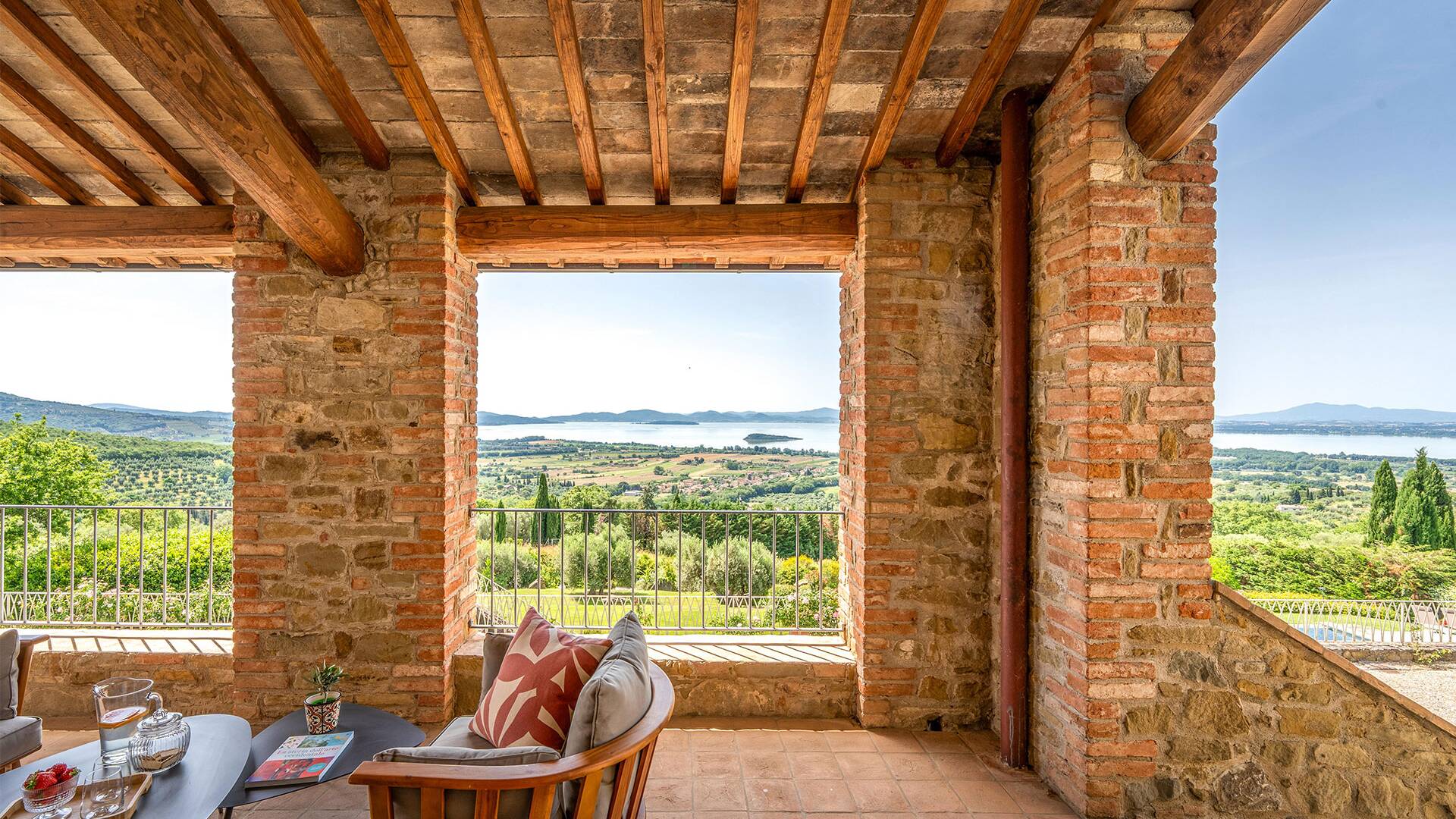 covered sitting area with lake view