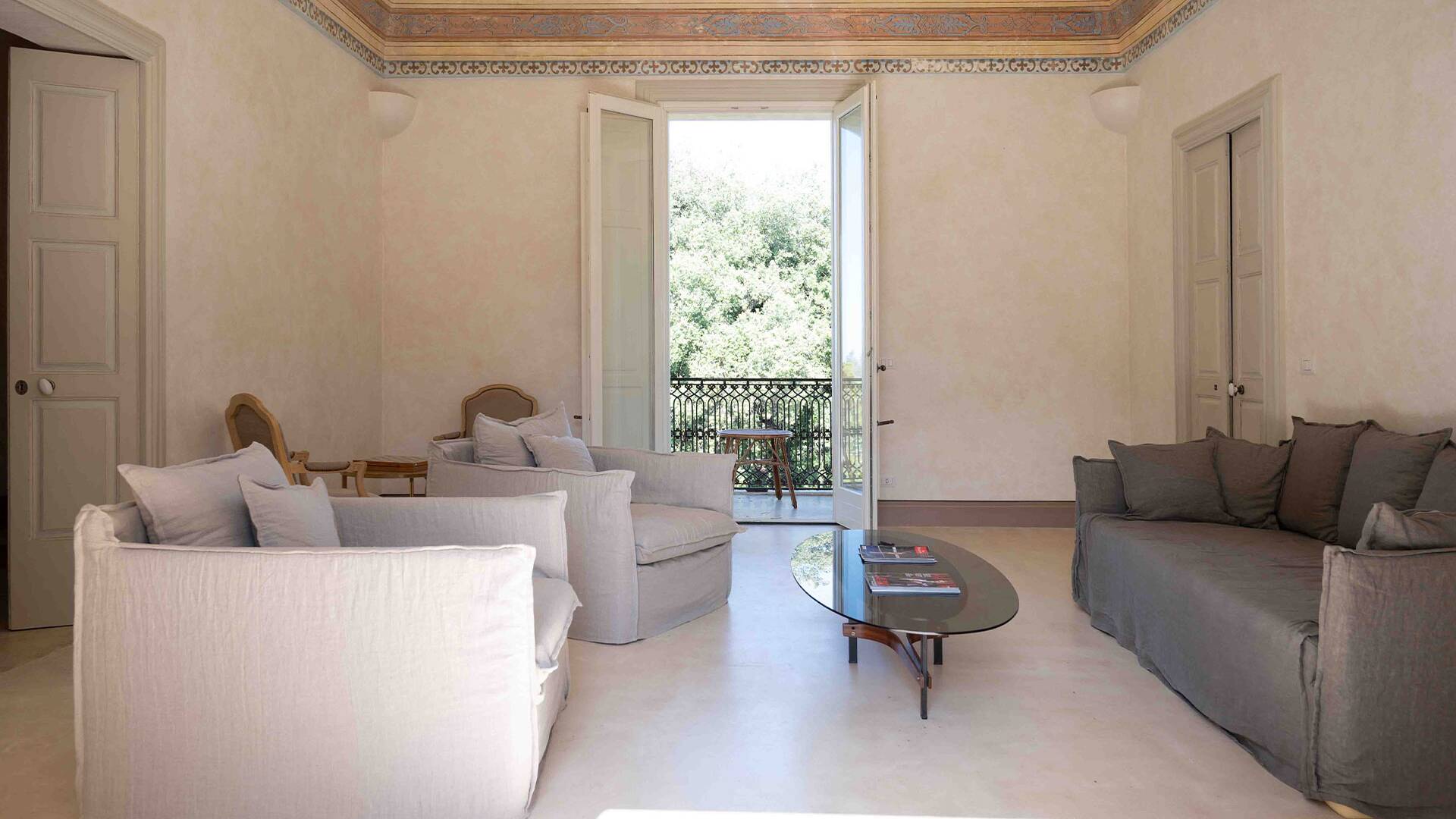 indoor living space with sofa and armchairs