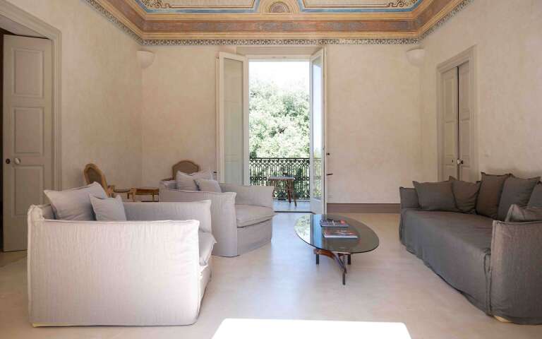 indoor living space with sofa and armchairs