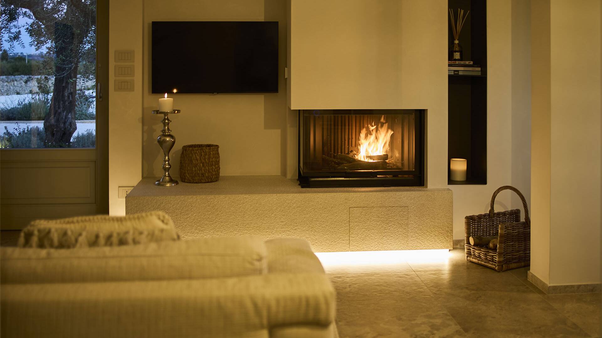 ground floor, living room with TV and fireplace