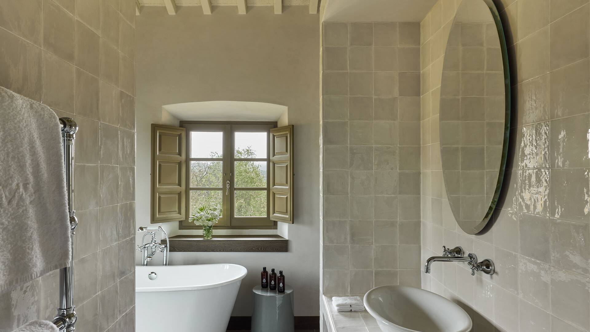 en suite bathroom with bath tub 