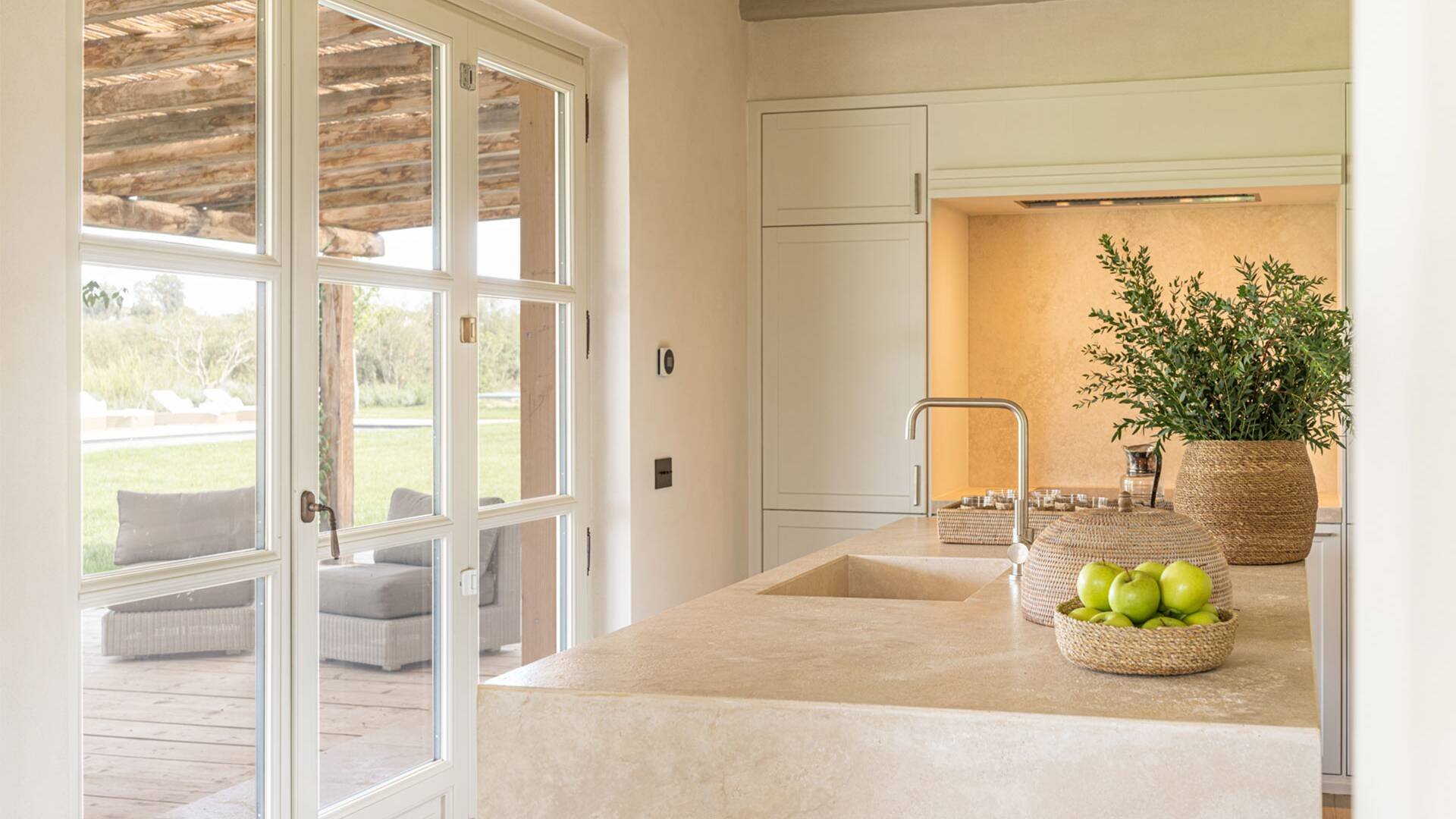 fully equipped kitchen with access to outdoors