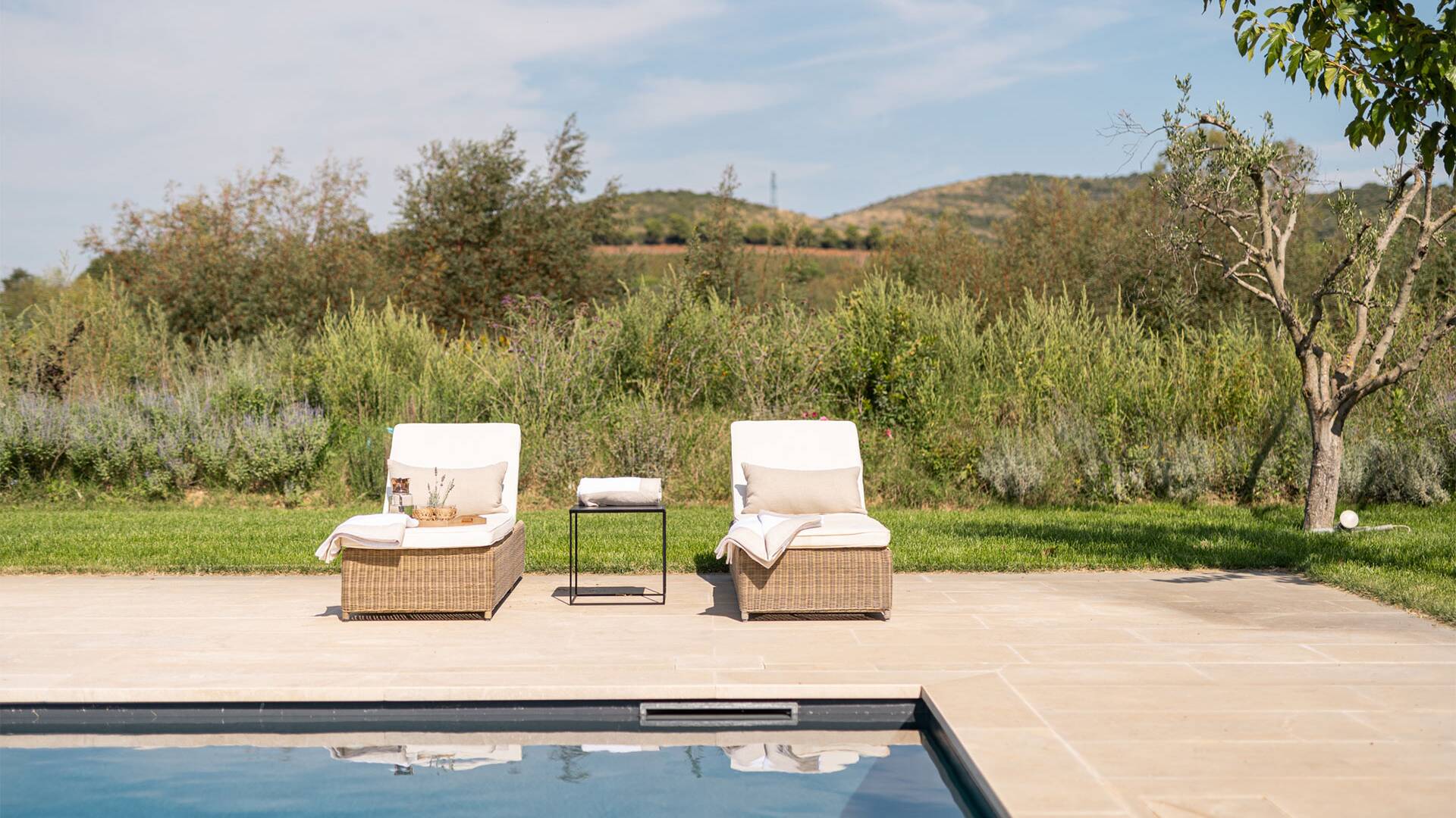 swimming pool with lounge area