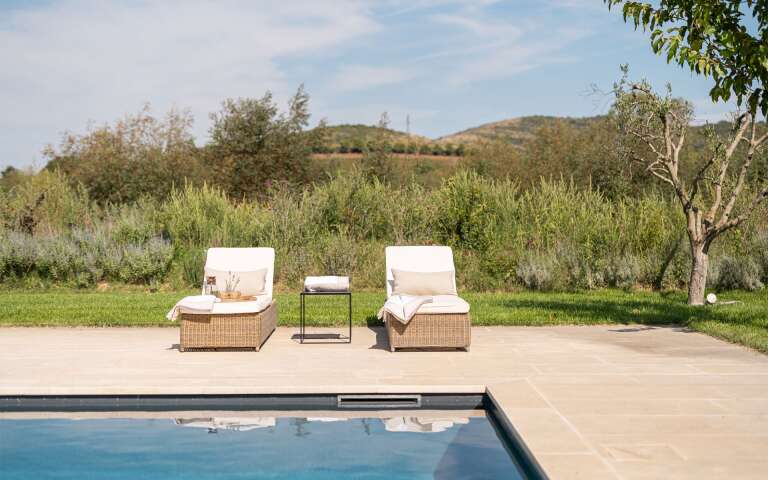 swimming pool with lounge area