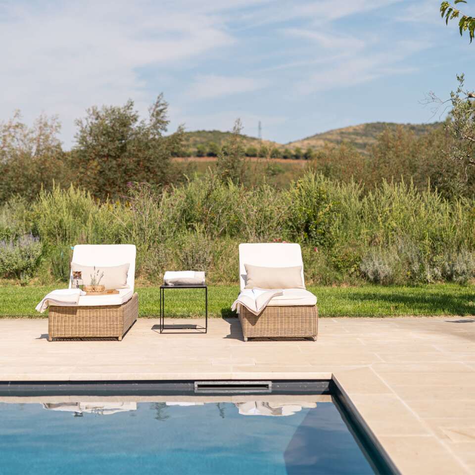 swimming pool with lounge area