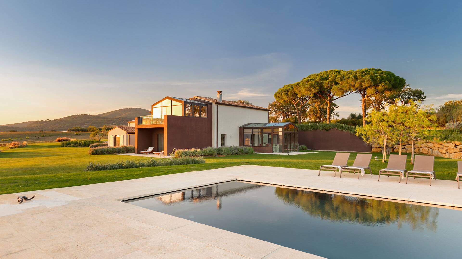 luxury swimming pool and sunbeds