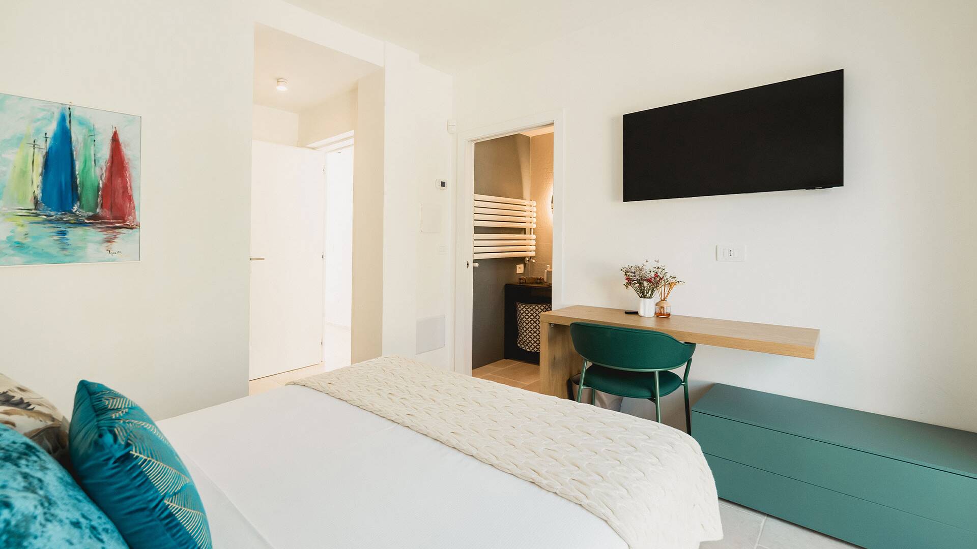 double bedroom with tv