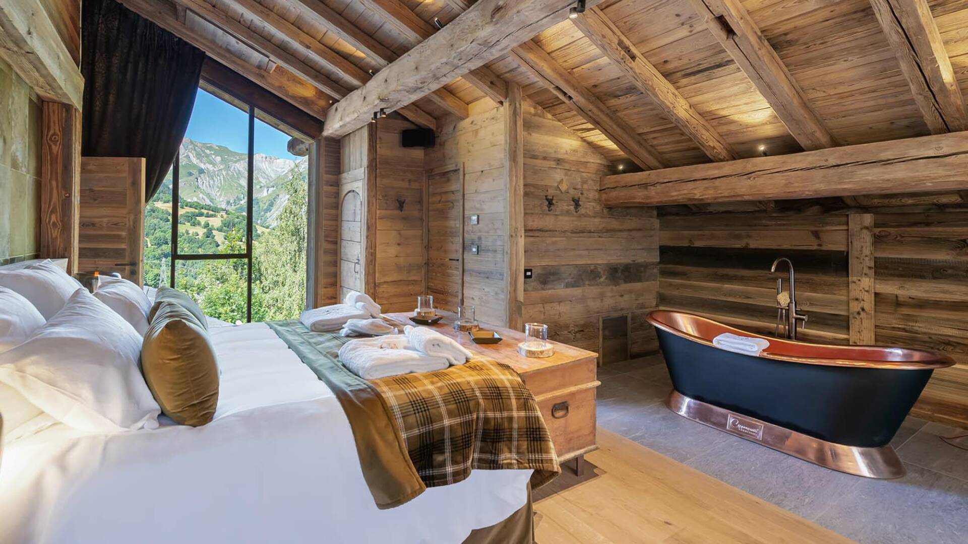double bedroom with en suite bathroom and bathtub