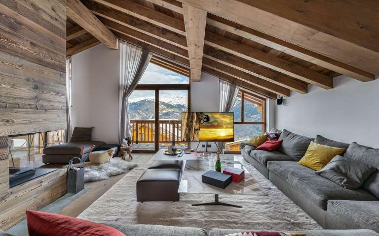 comfortable living room with large u shape sofa and fireplace