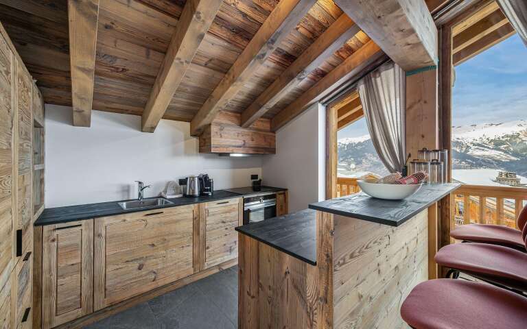 fully equipped kitchen with breakfast table