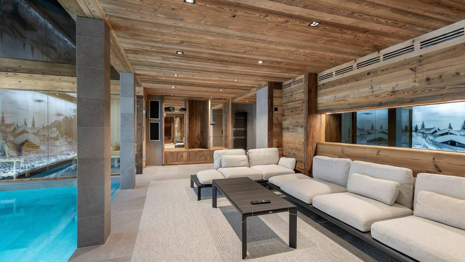lounge area next to the swimming pool 