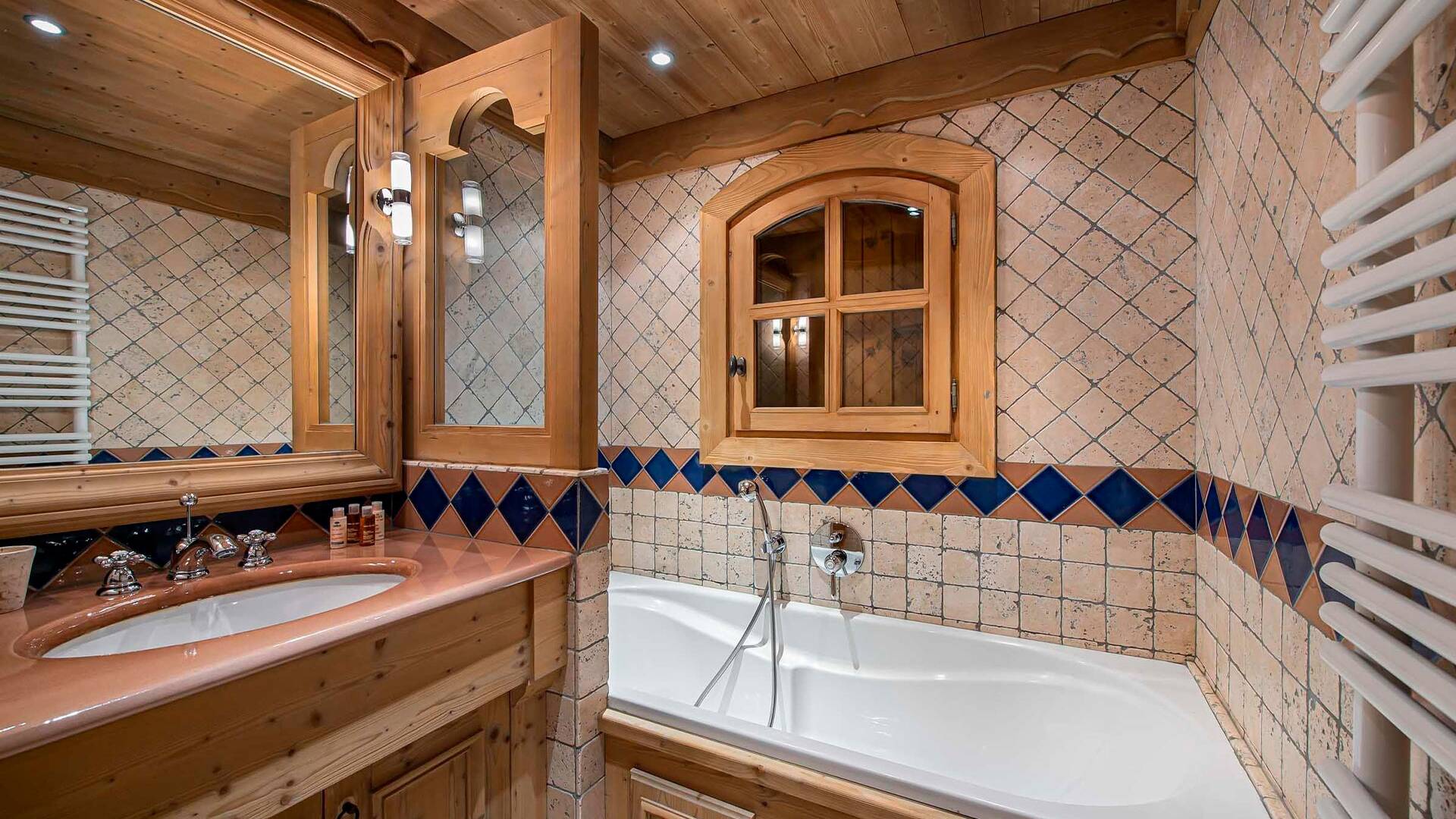 en suite bathroom with bath tub