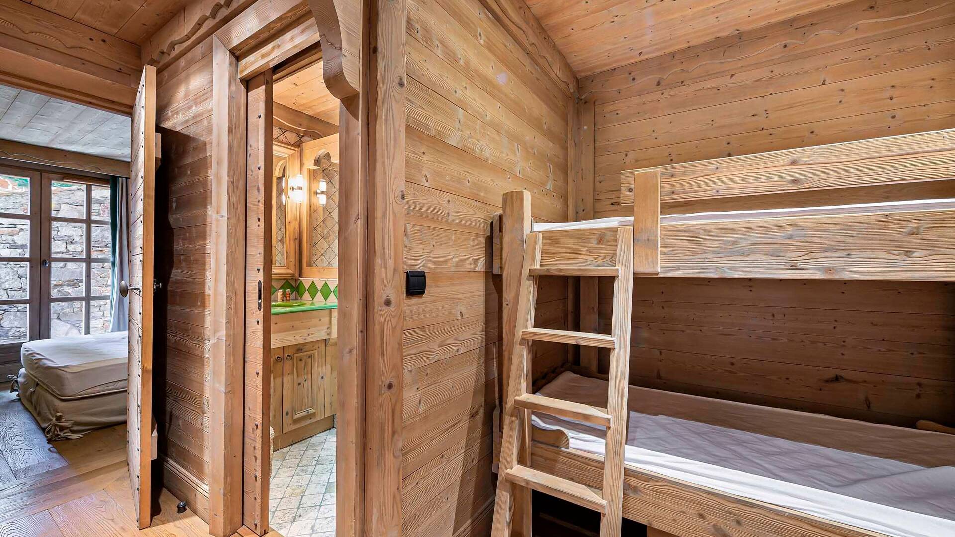 family bedroom with one double bed and one bunk bed, en suite bathroom