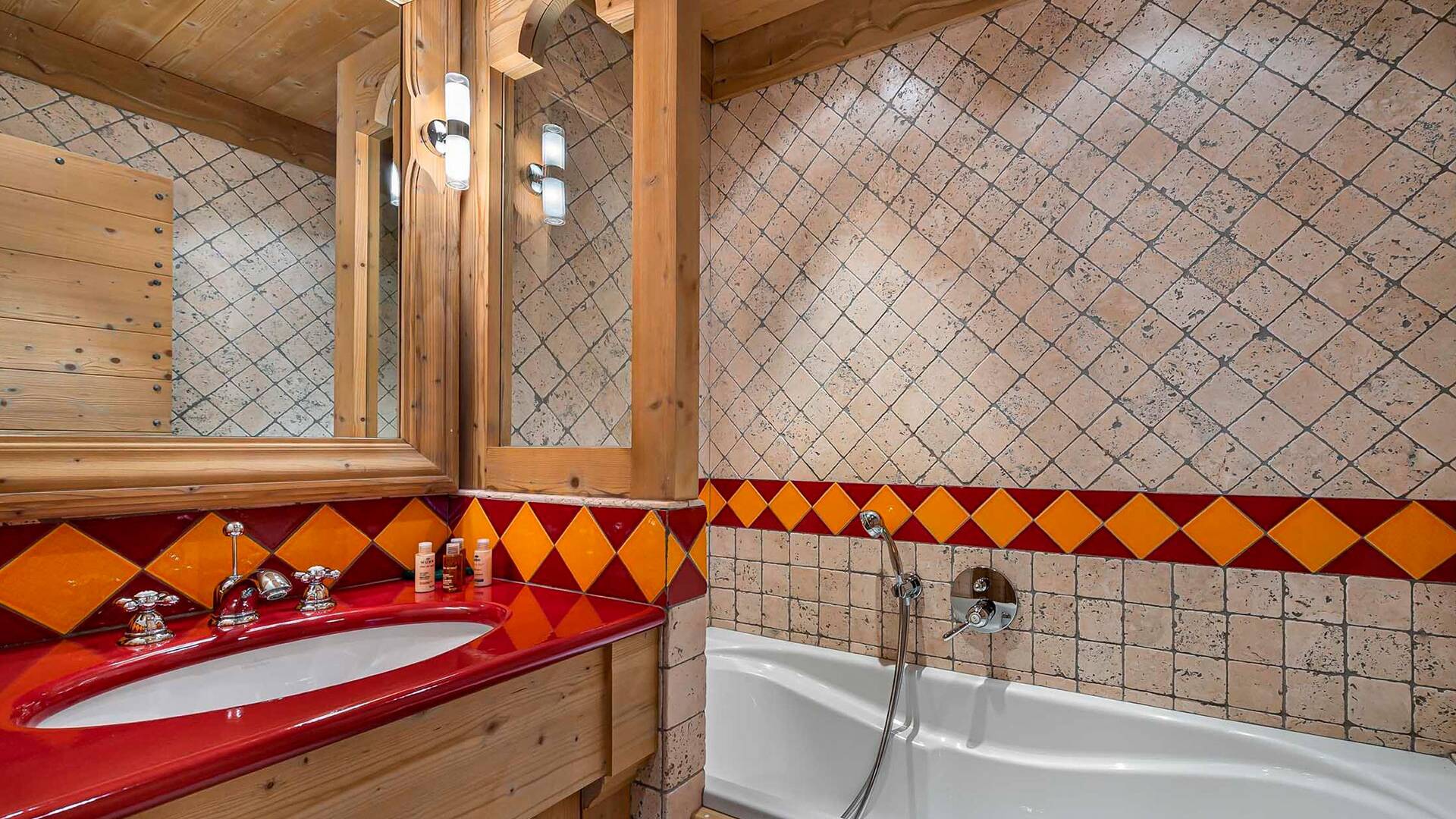 en suite bathroom with bath tub 