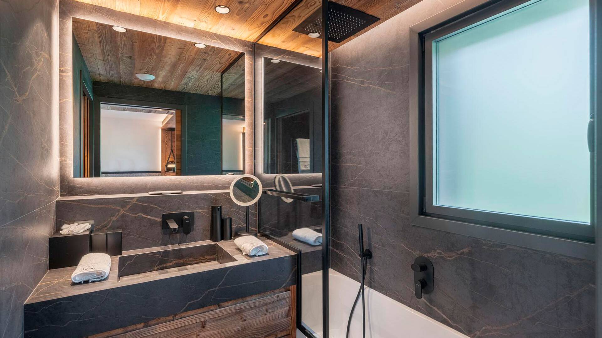 en suite bathroom with bath tub
