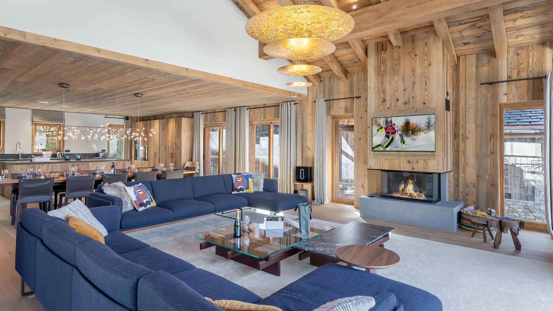 warm and inviting space with large sofa and a fireplace