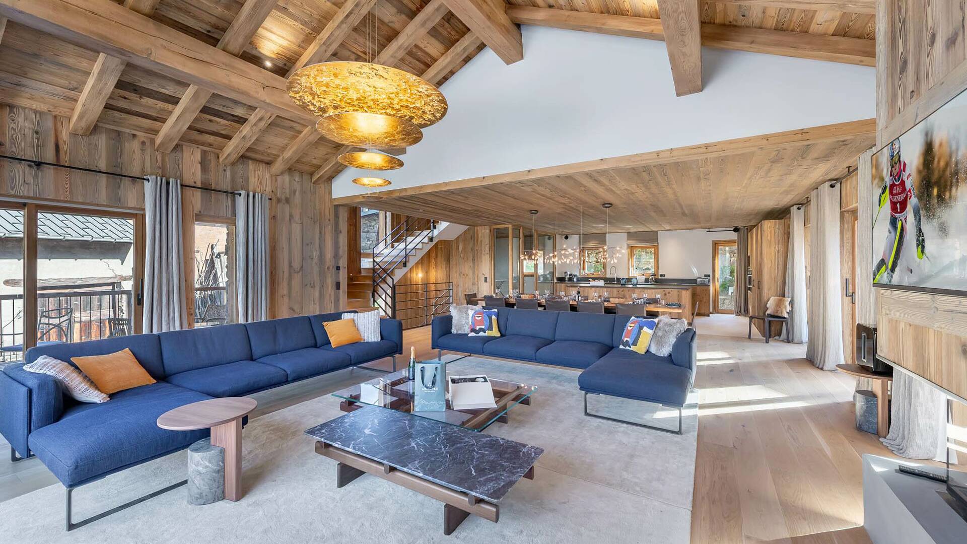warm and inviting space with large sofa and a fireplace