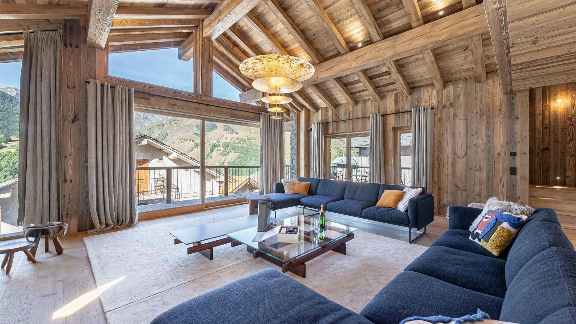 warm and inviting space with large sofa and a fireplace