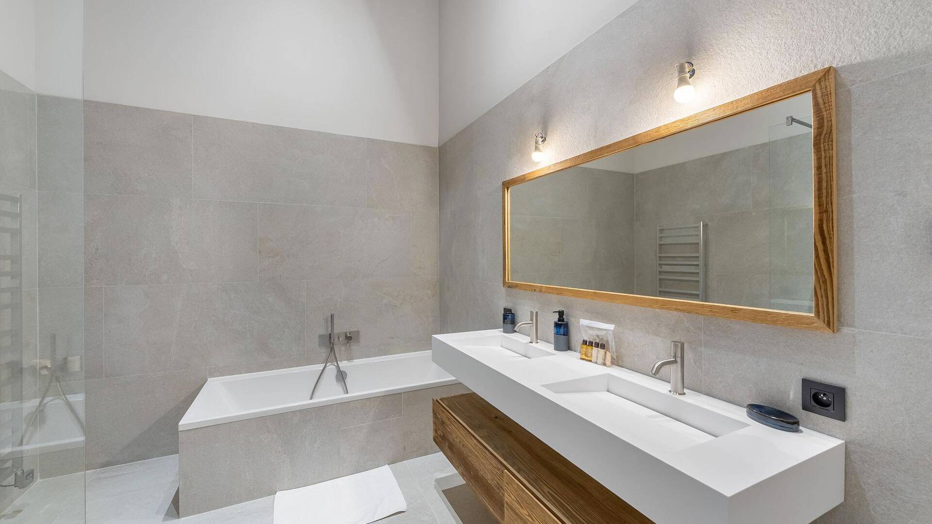 elegant bathroom with walk-in shower and tub
