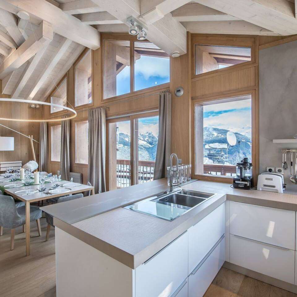 fully equipped kitchen with mountain views