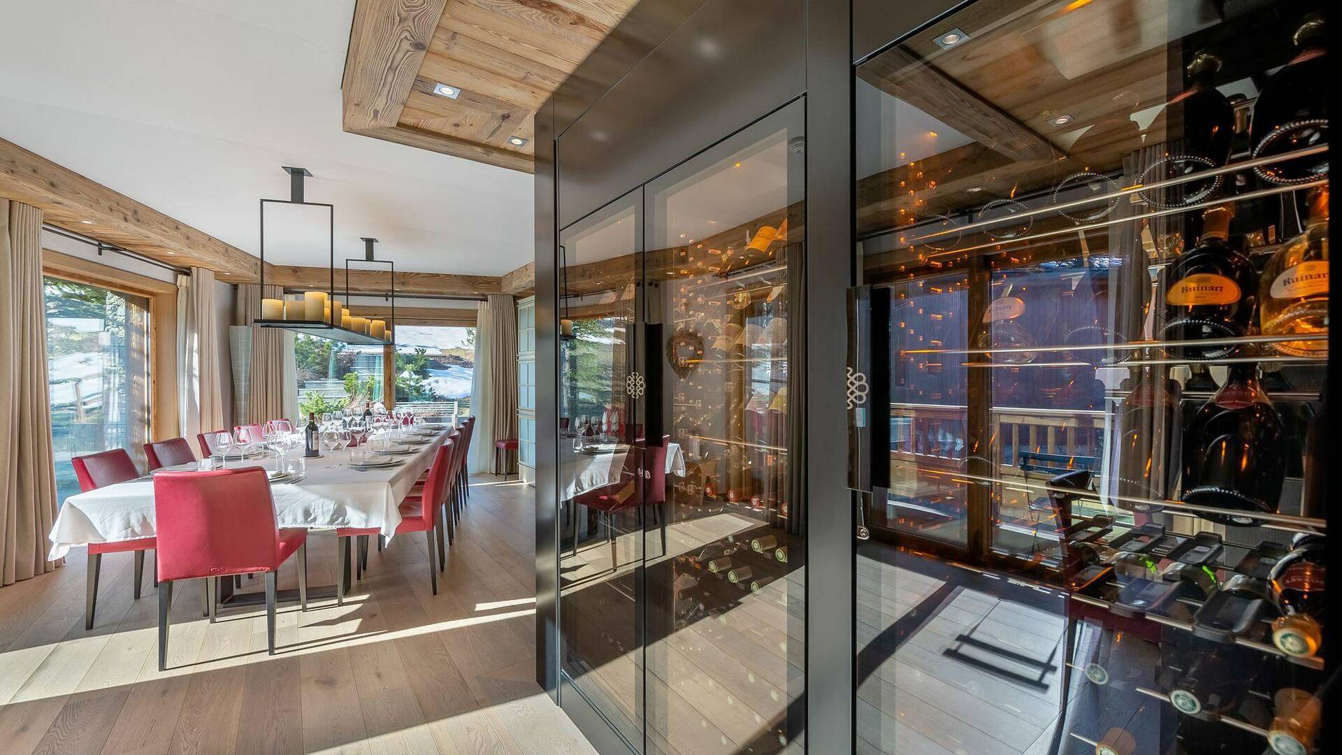 beautiful dining table featuring wine cellar